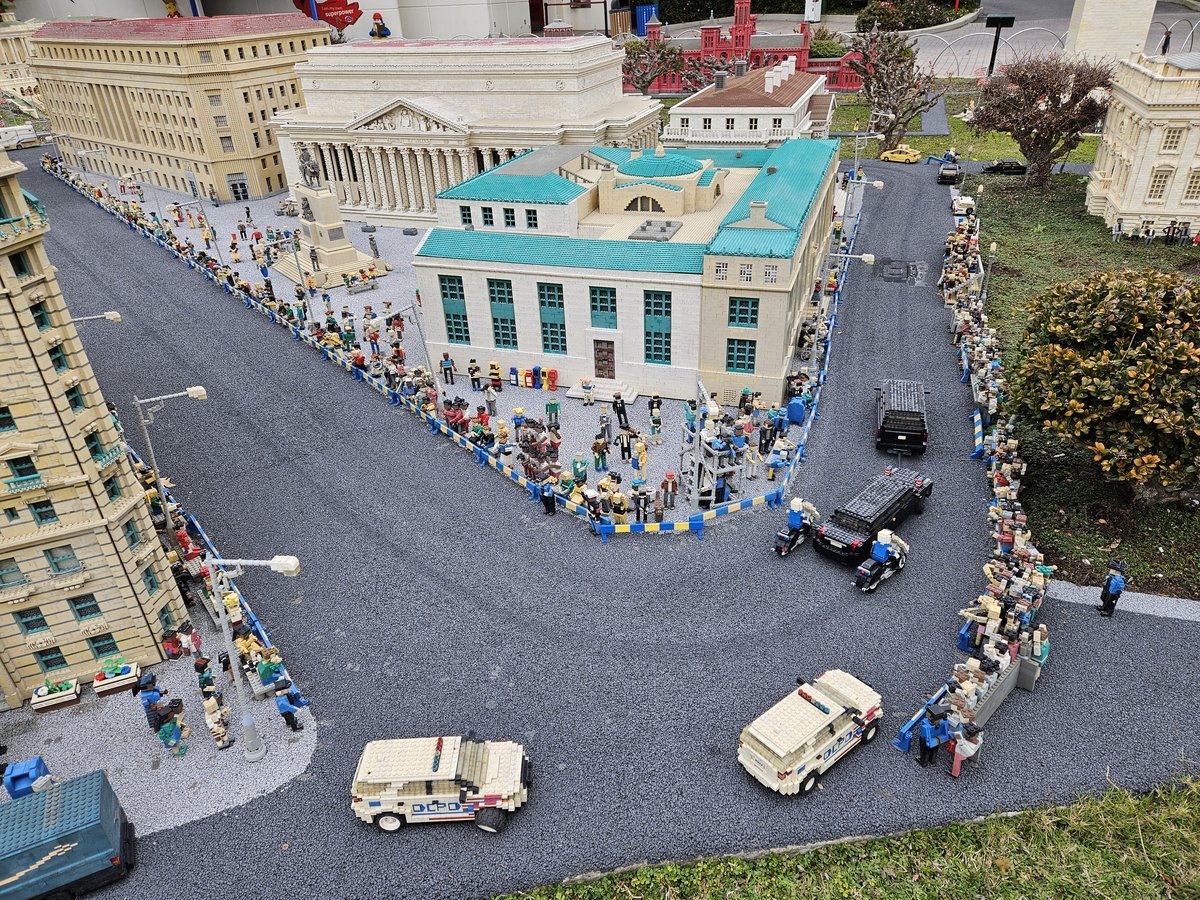 LEGO Miniland USA: Washington D.C. street scene with the Washington Monument in the background, LEGO figures and cars on the roads