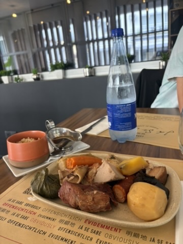 Plate of cozido das Furnas, meat and vegetables slow-cooked in volcanic heat, served with rice