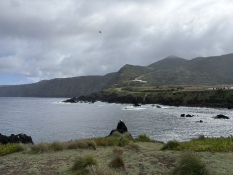 Dramatic volcanic coastline near Mosteiros, Azores, with cliffs and rough sea