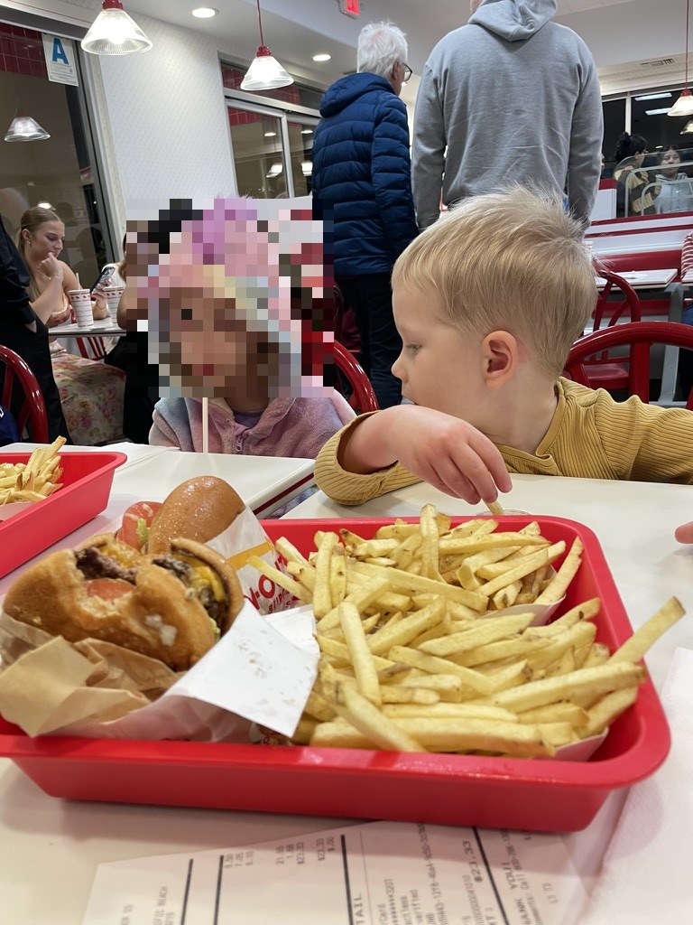 Kids at In-N-Out Burger on arrival day