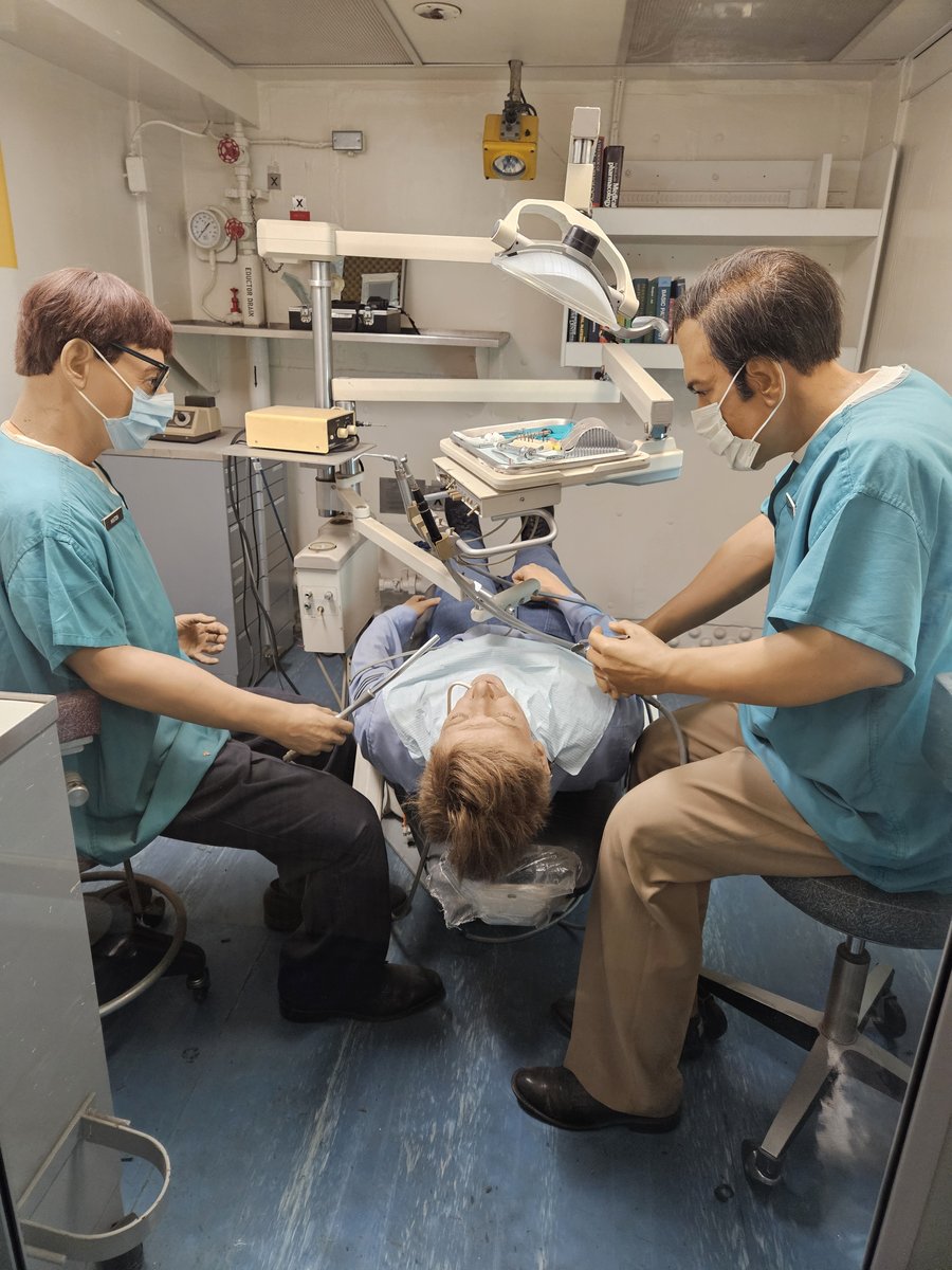 The surgery room aboard USS Midway with mannequins depicting a procedure — real medical equipment in a room that belongs inside a ship