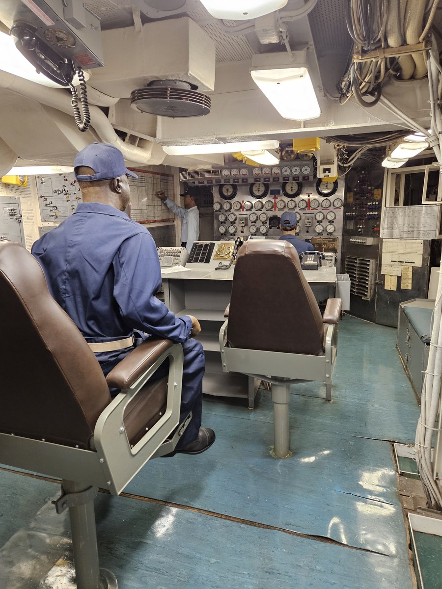 Inside the cockpit of one of the aircraft on display on the USS Midway flight deck