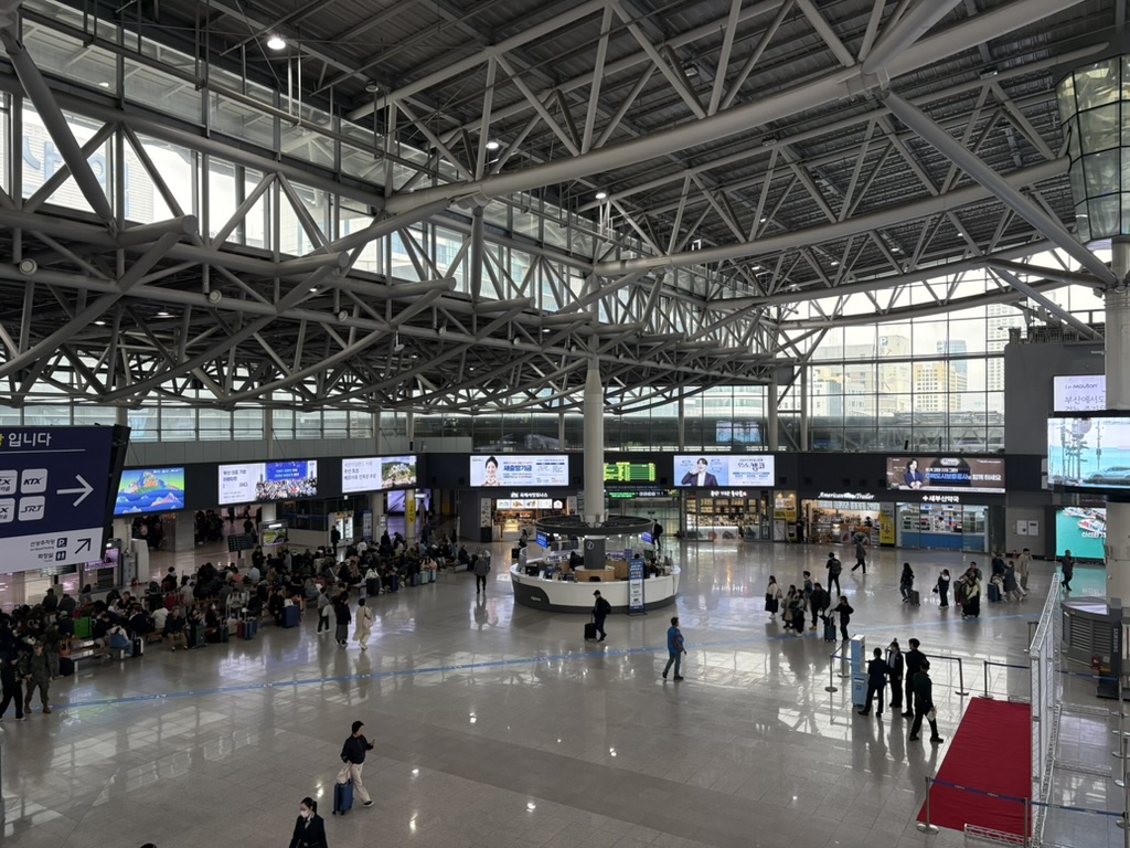 Busan Station concourse with KTX and SRT signs