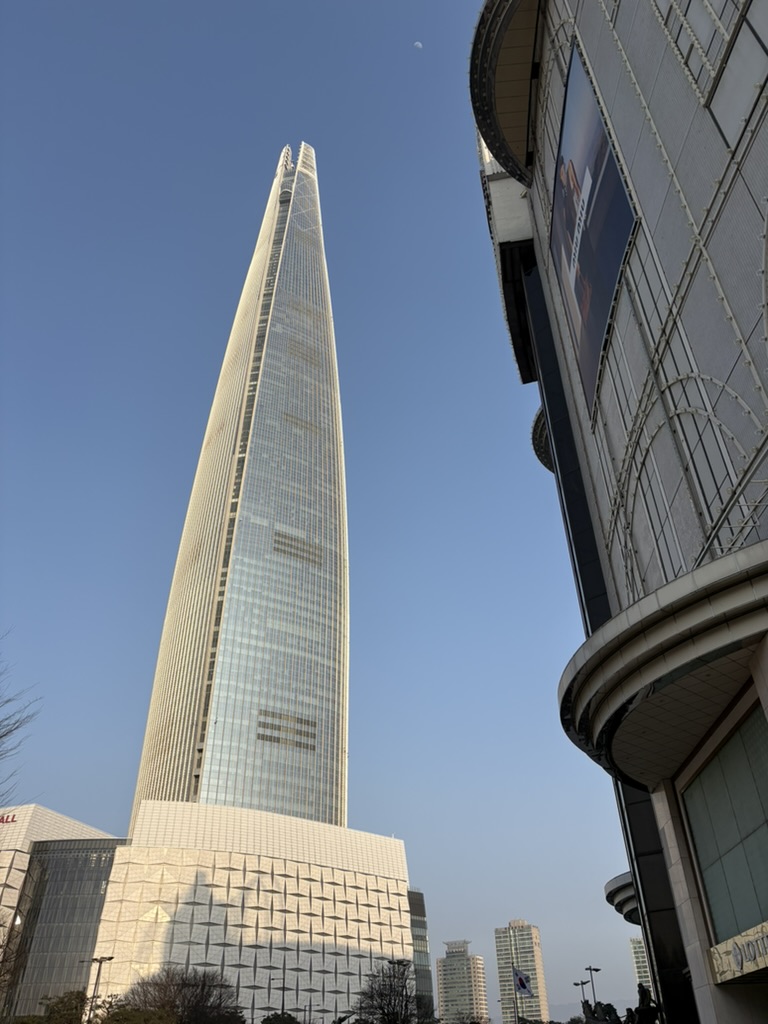 Lotte World Tower skyscraper seen from the park exit, Seoul