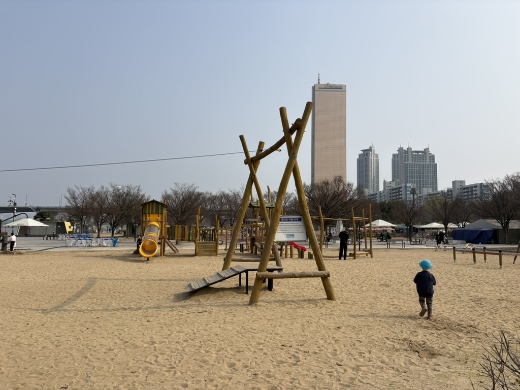 Playground at Yeouido Hangang Park with Seoul skyline